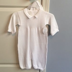 Baby white one piece outfit with cross detail